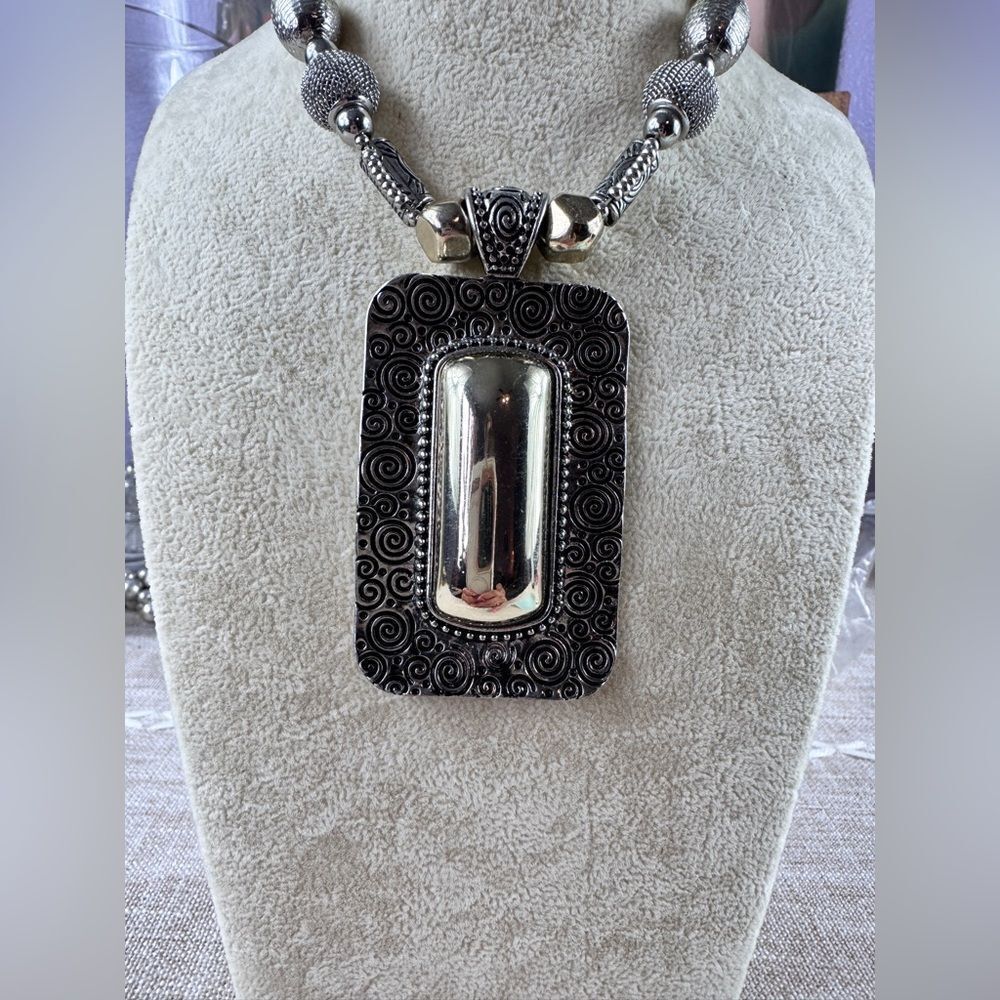 Chico’s Silver and Gold Pendant Necklace